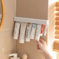 no-drill toothpaste tube holder for bathroom organization